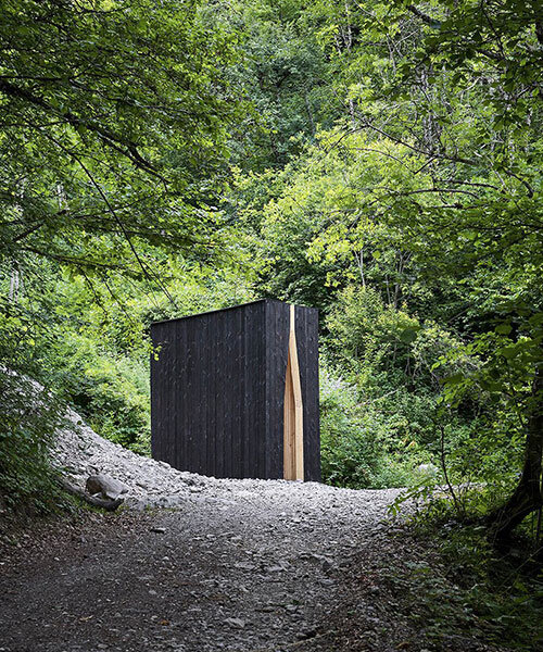 'chapel of the tears' by atelier poem stands in solitude within natural landscape in france