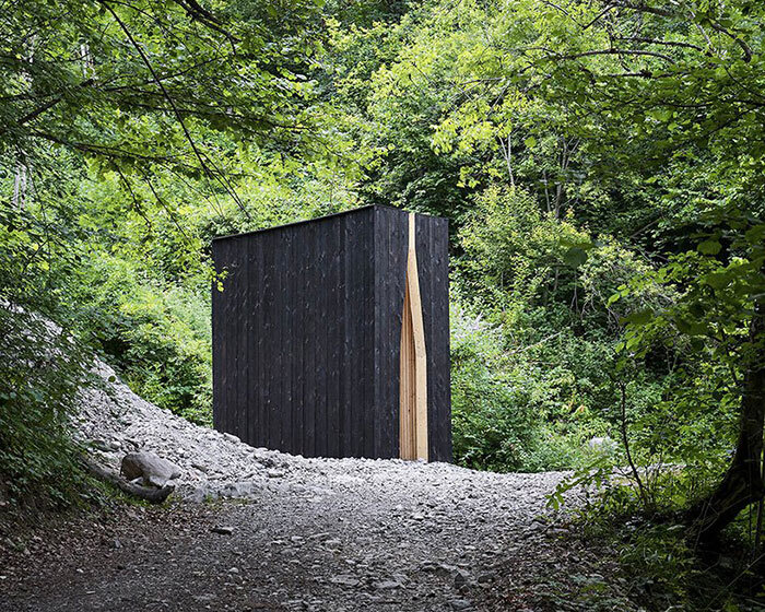 'chapel of the tears' by atelier poem stands in solitude within natural landscape in france
