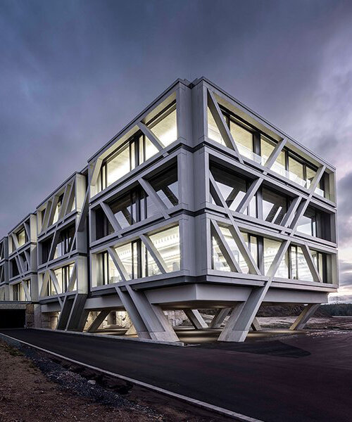a concrete skeleton encases IGZ campus in germany, designed by j. mayer h. 