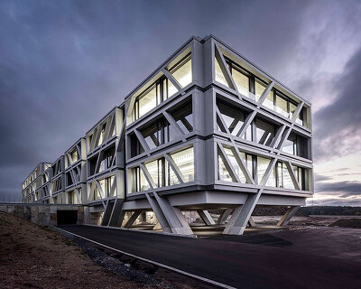 a concrete skeleton encases IGZ campus in germany, designed by j. mayer h. 