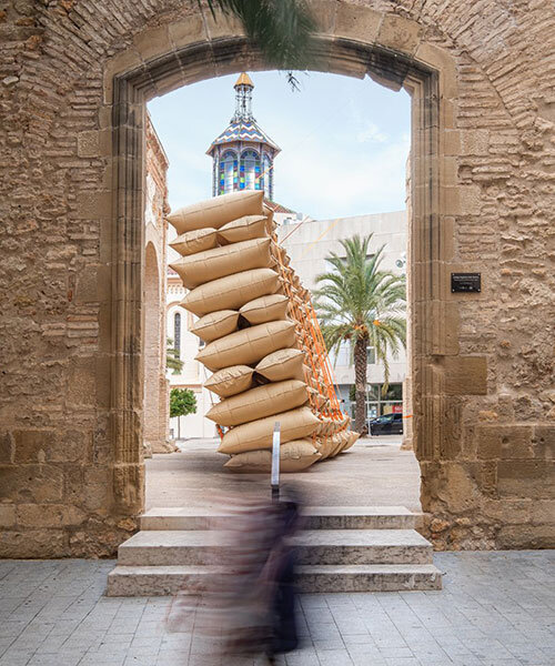 dunnage airbag installation stands & collapses next to historic ruins of tortosa, spain