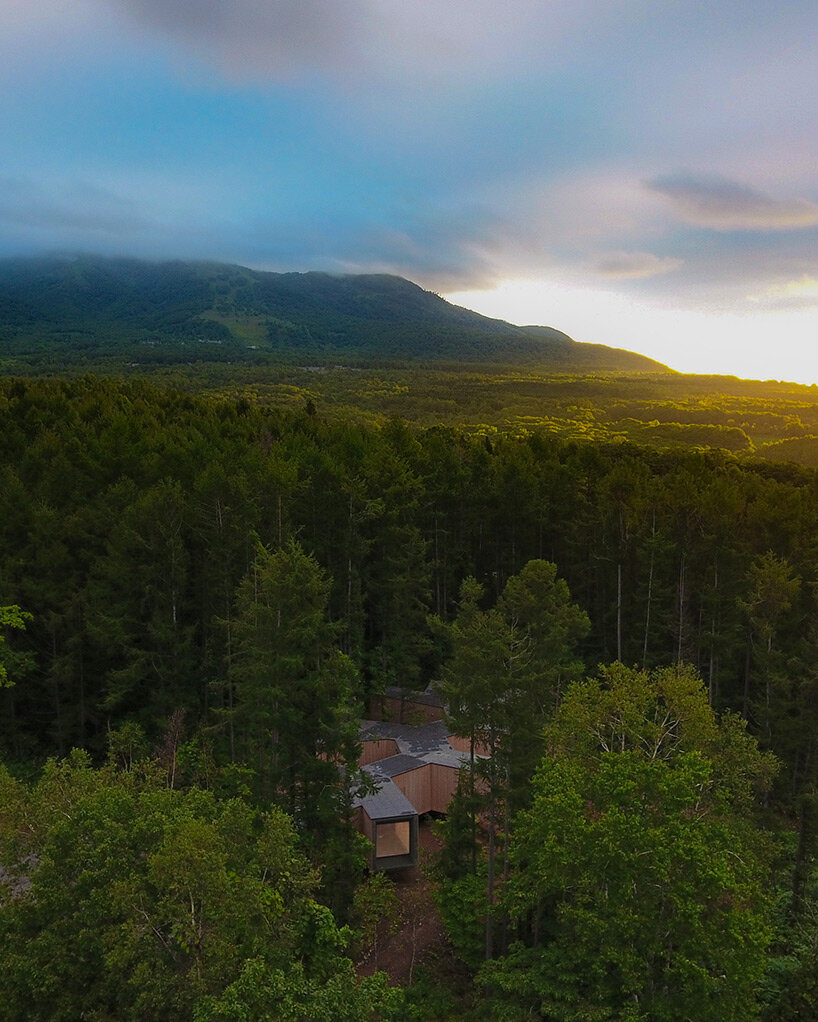 'house in the forest' by florian busch architects is a remote retreat in the woods of hokkaido