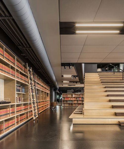 large library & 'agora' gathering space organize law firm office interior by esrawe in mexico