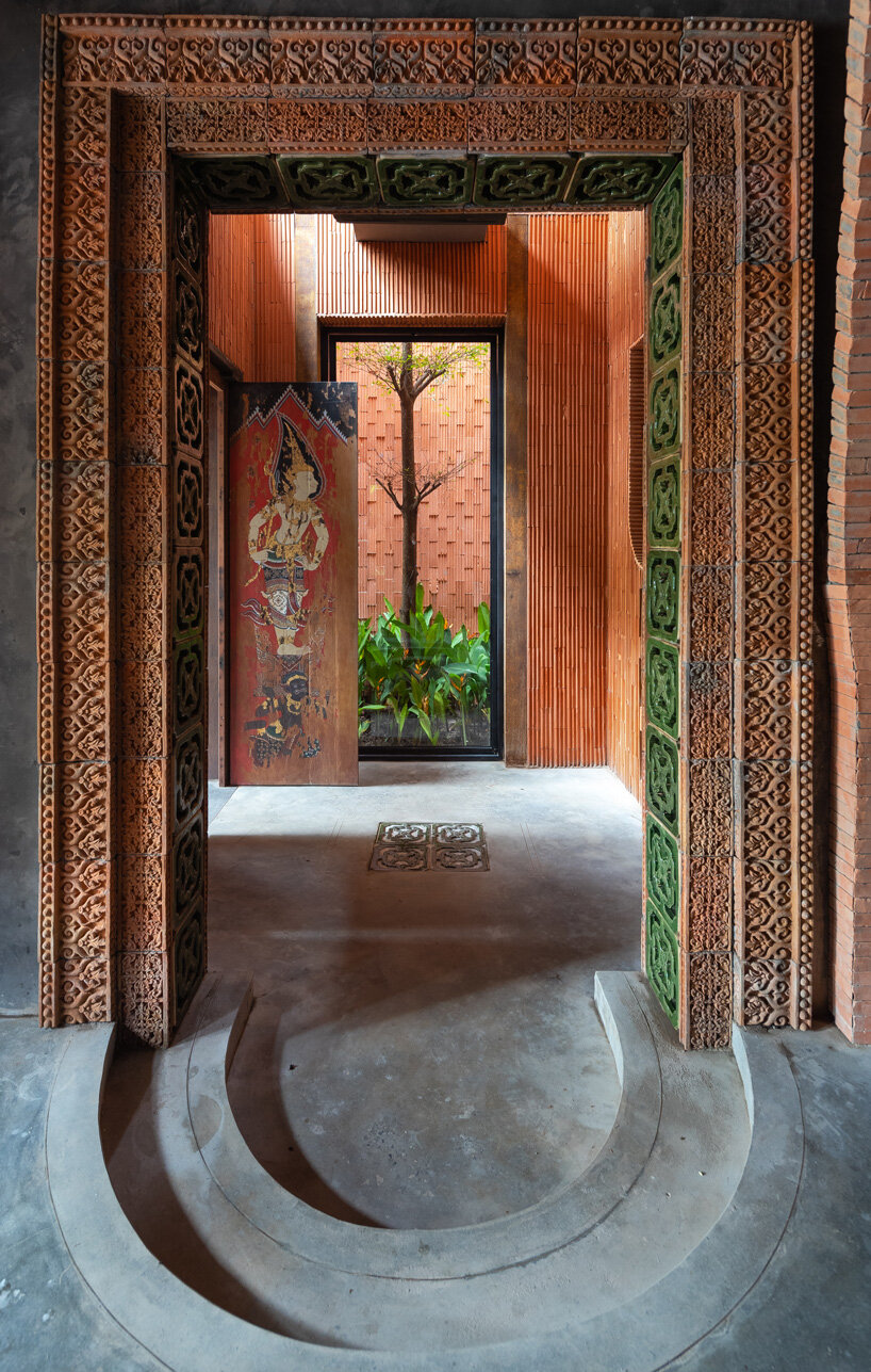 le house designs vegetarian restaurant in vietnam to resemble a champa red brick temple