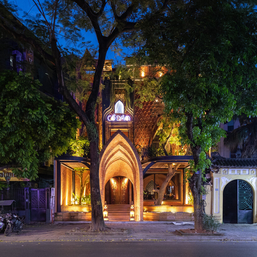 le house designs vegetarian restaurant in vietnam to resemble a champa red brick temple