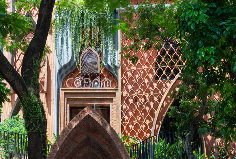 exterior - le house designs vegetarian restaurant in vietnam to resemble a champa red brick temple