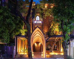 le house designs vegetarian restaurant in vietnam to resemble a champa red brick temple