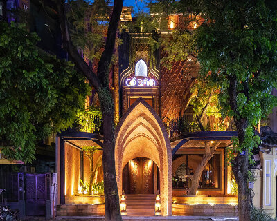 le house designs vegetarian restaurant in vietnam to resemble a champa red brick temple