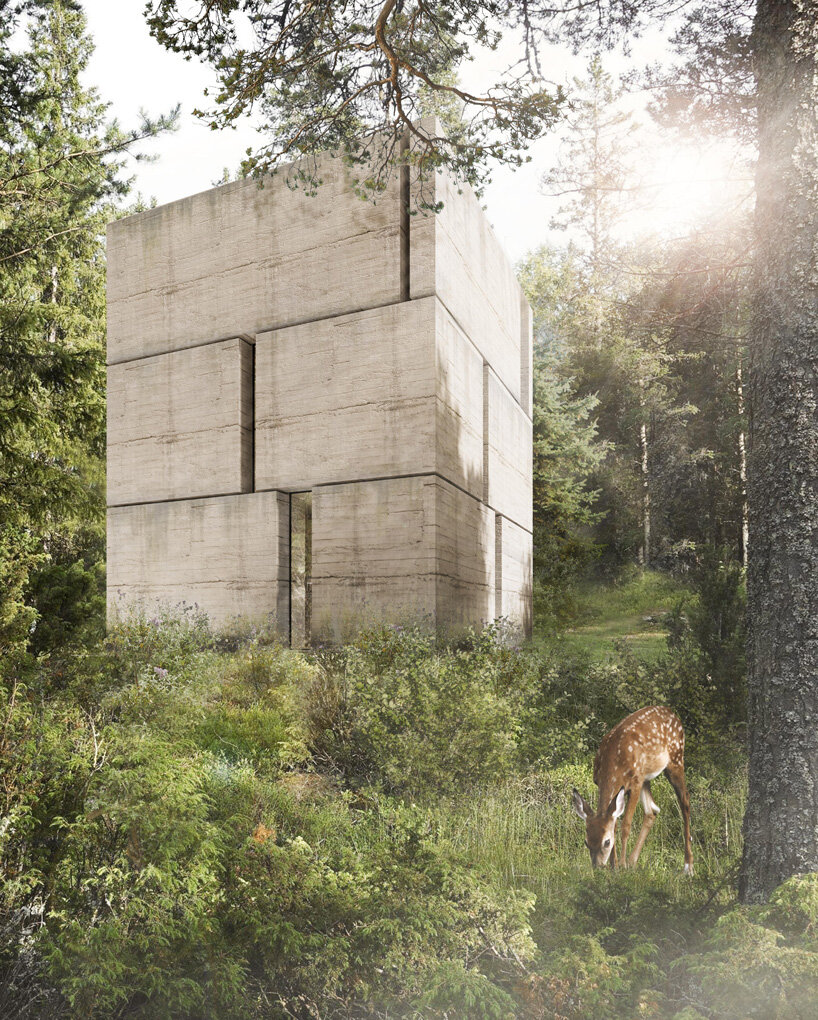 marte marte architects sets tiny monolithic house in the middle of a forest clearing