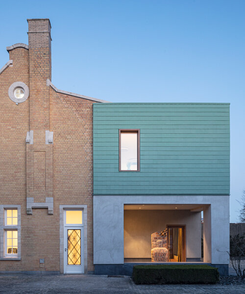 green pre-patinated copper clads this extension by declerck-daels architecten in belgium 