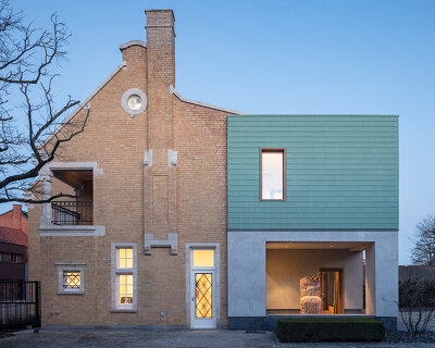 green pre-patinated copper clads this extension by declerck-daels architecten in belgium 