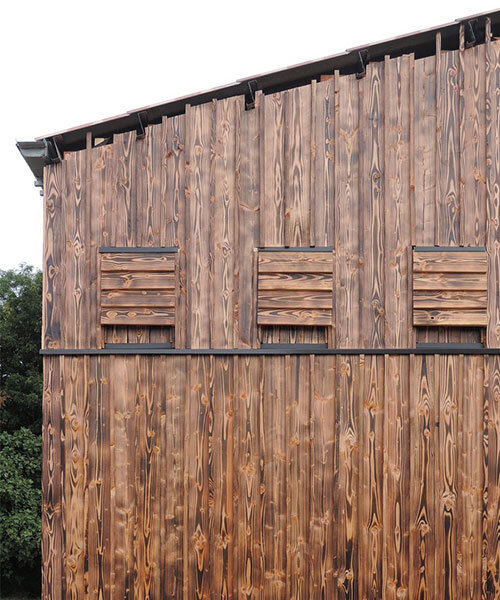 moonwalk local clads wine cellar in france with bat shelter wooden facade