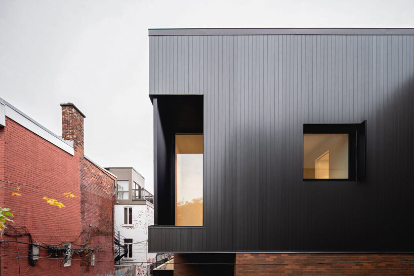 naturehumaine adds metal-clad extension to victorian house renovation in canada