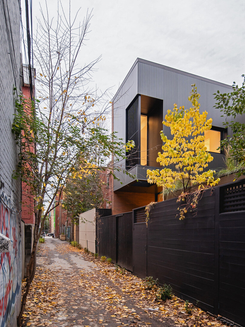 naturehumaine adds metal-clad extension to victorian house renovation in canada