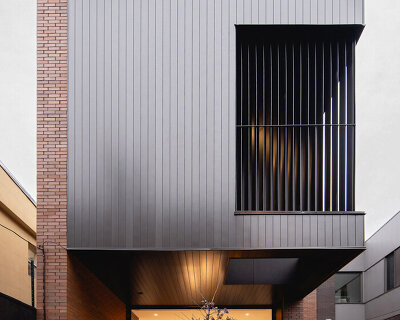 naturehumaine adds metal-clad extension to victorian house renovation in canada