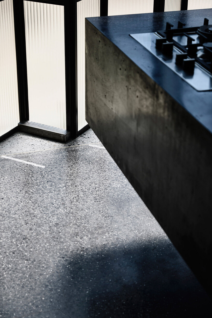 robert simeoni architects inserts pleated glass windows to powell street house in australia