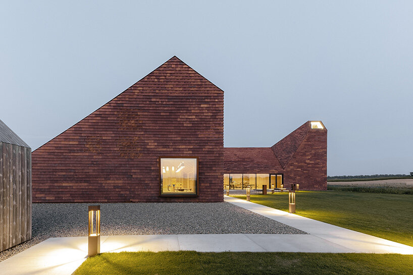 reiulf ramstad recalls jutland's agricultural heritage with 'grain house' visitor center