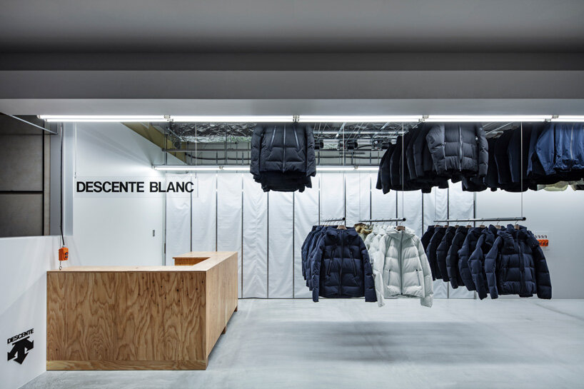 schemata architects completes 'descente blanc' store in sapporo with movable hanger system