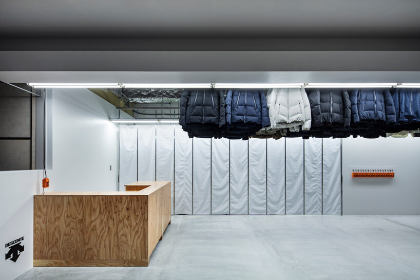 schemata architects completes 'descente blanc' store in sapporo with movable hanger system