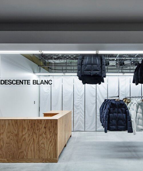 schemata architects completes 'descente blanc' store in sapporo with movable hanger system