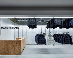 schemata architects completes 'descente blanc' store in sapporo with movable hanger system