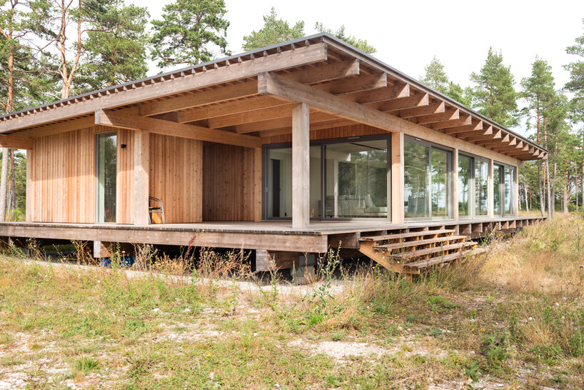 scott rasmusson källander builds five timber houses on a swedish island designboom