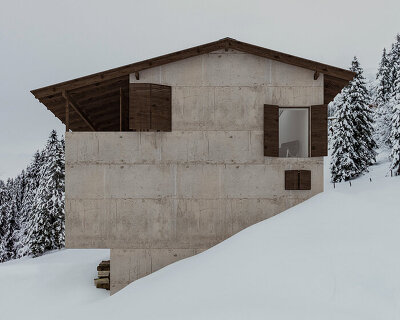 besim krosa envisions his villa in brezo as a snowy mountain refuge in raw concrete