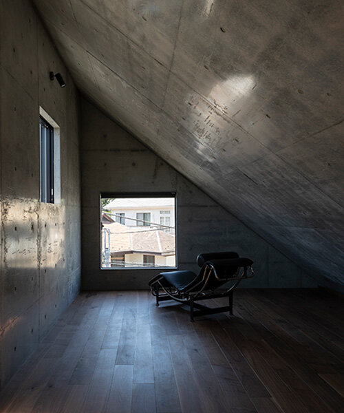 IKAWAYA architects constructs 'embracing' concrete shell house in tokyo