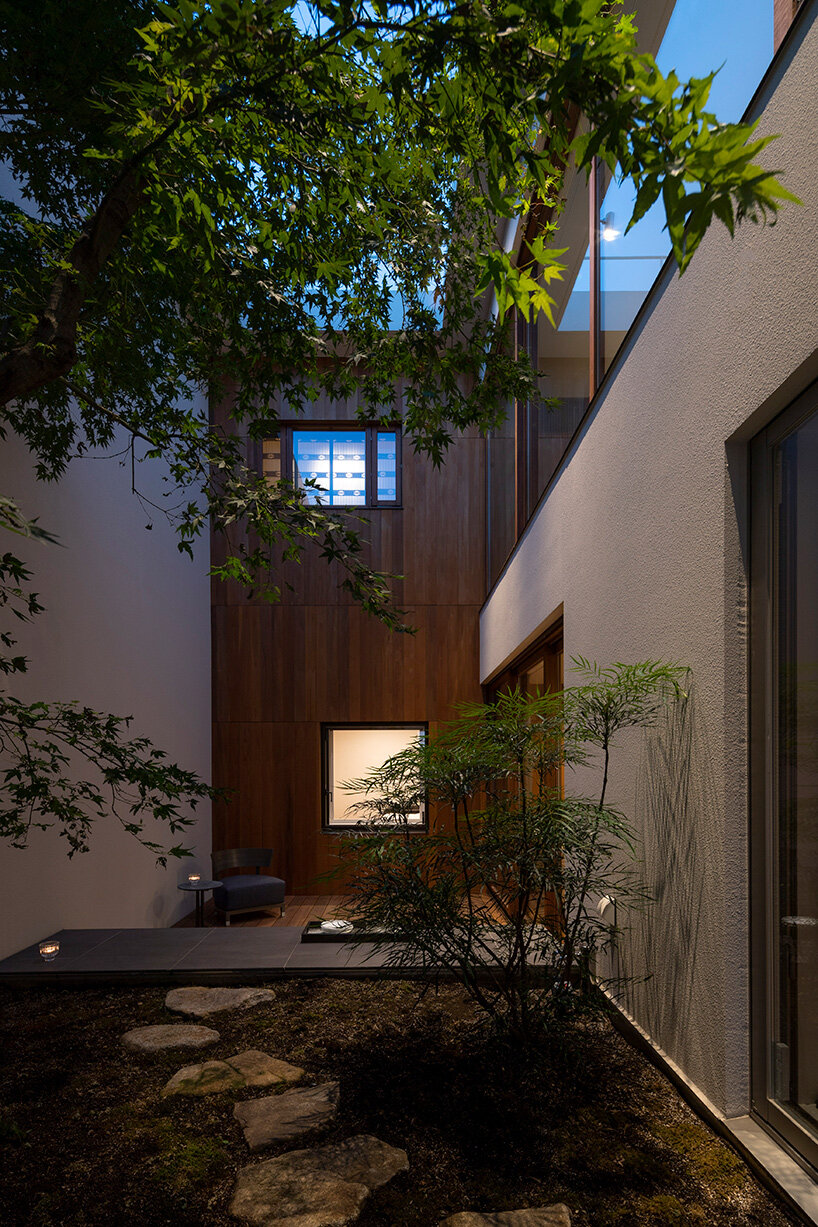 a 'sky cave' crowns this three-storey building in tokyo by IKAWAYA architects