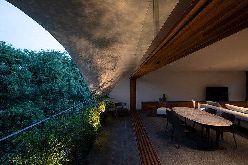 a 'sky cave' crowns this three-storey building in tokyo by IKAWAYA architects