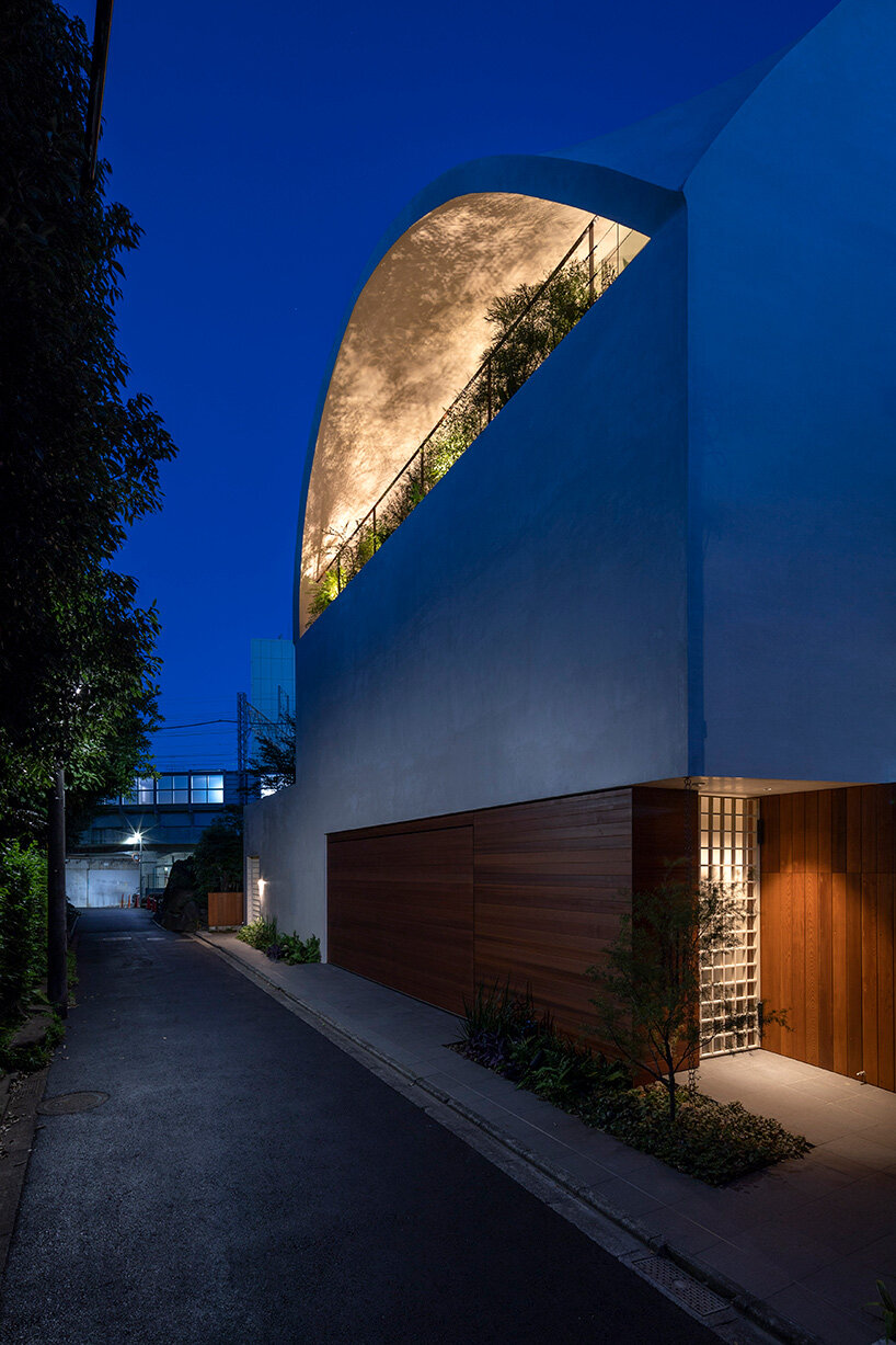 a 'sky cave' crowns this three-storey building in tokyo by IKAWAYA architects