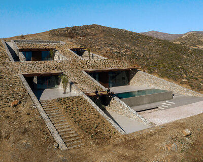 mold architects embeds nCAVED house into the island cliffs of greece