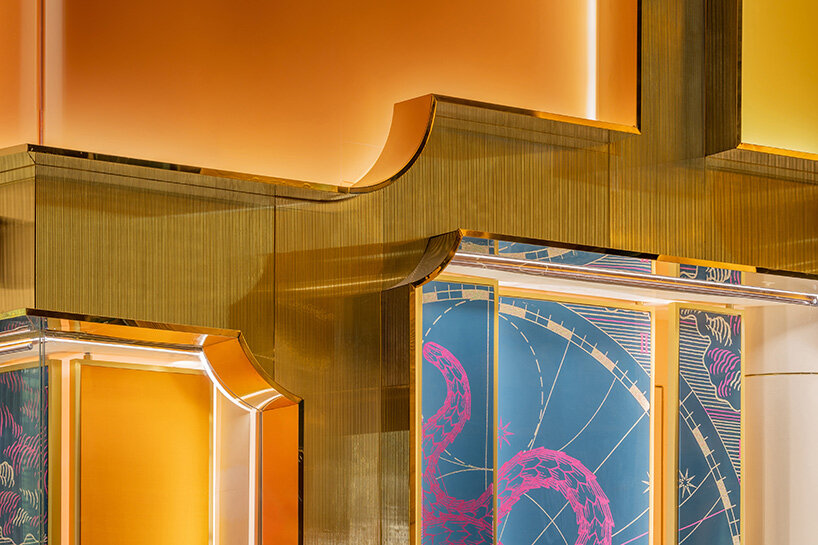 MVRDV references bulgari's first store in rome with brass and glass façade in bangkok