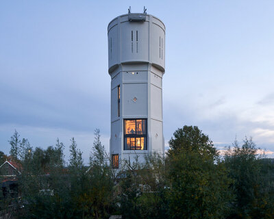 RVArchitecture transforms water tower in the netherlands to contain two unique dwellings