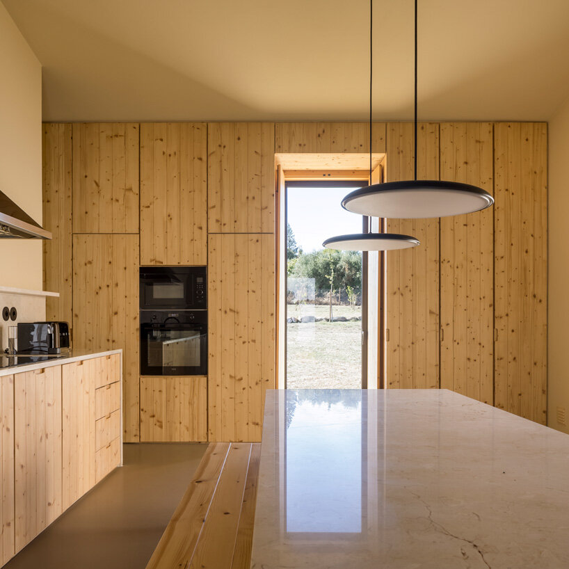 bica arquitectos combines two contiguous volumes into 'house in alentejo' in rural portugal