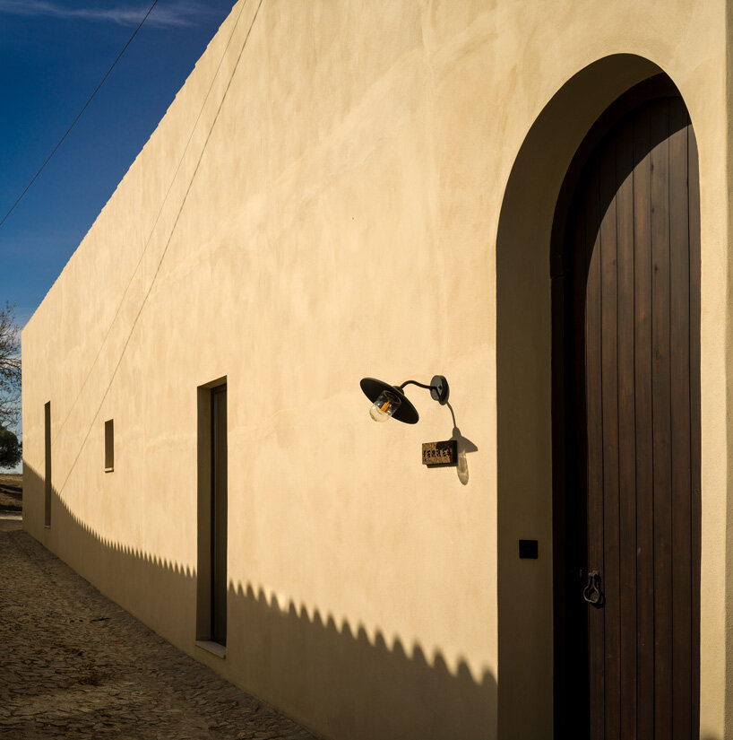bica arquitectos combines two contiguous volumes into 'house in alentejo' in rural portugal