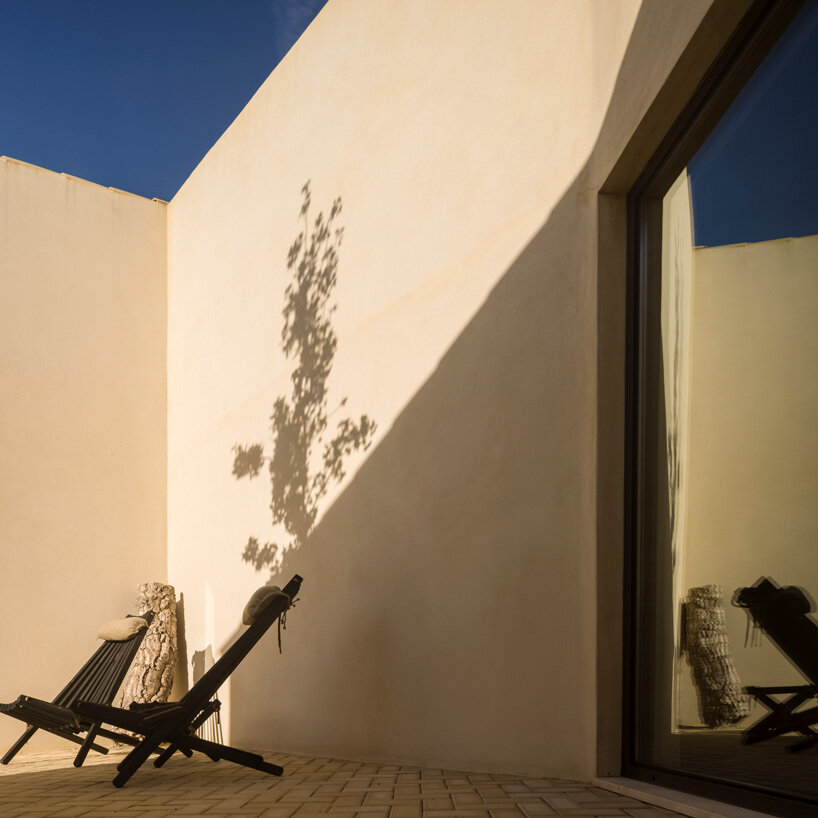bica arquitectos combines two contiguous volumes into 'house in alentejo' in rural portugal