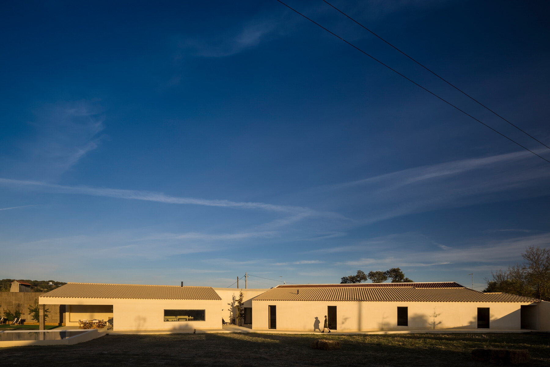 bica arquitectos combines two contiguous volumes into 'house in alentejo' in rural portugal