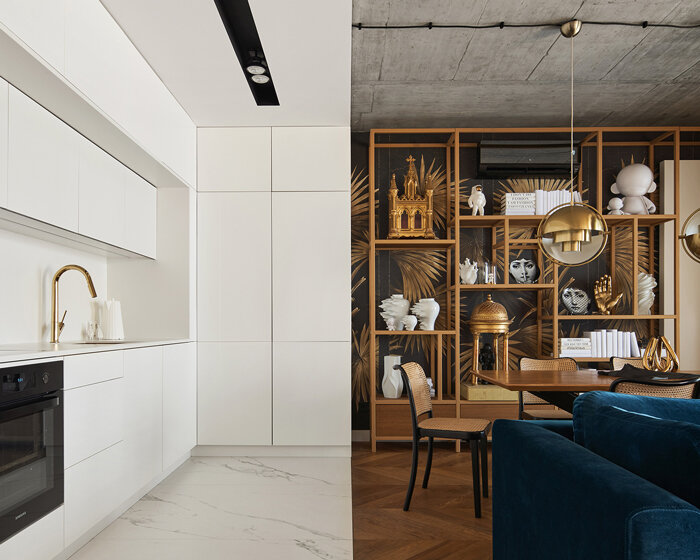 carrara marble contrasts with exposed concrete in the 'geometry apartment' in krakow