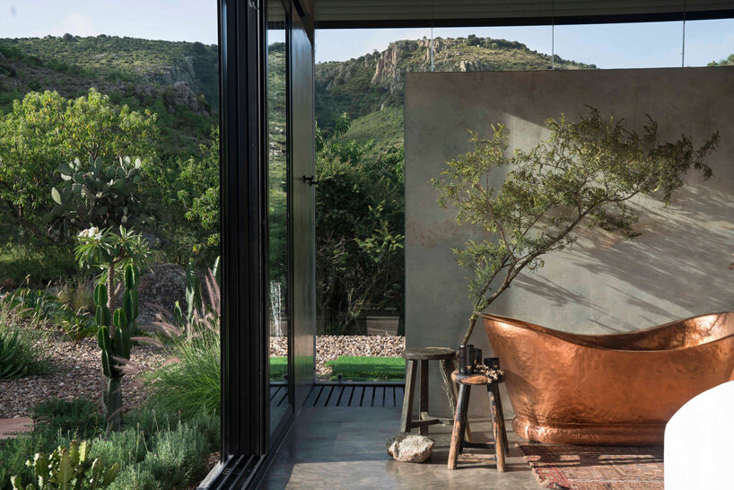 casa etérea is an off-grid glass house set on the slopes of an extinct volcano in mexico