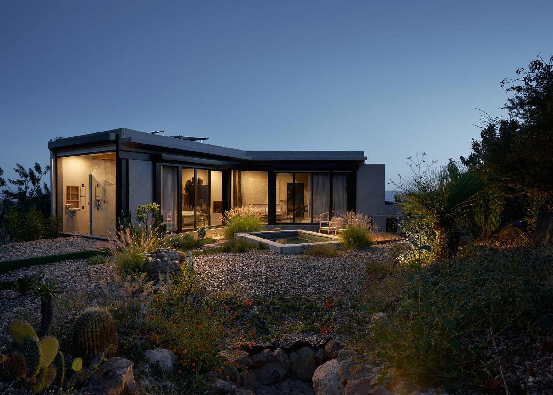 casa etérea is an off-grid glass house set on the slopes of an extinct volcano in mexico