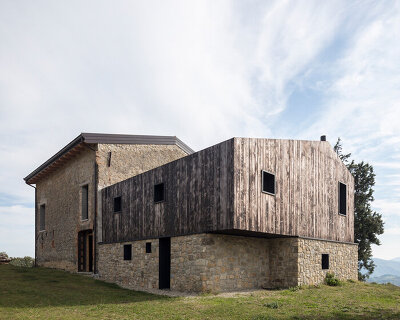 ciclostile architettura reconstructs an old farmer's house in rural bologna