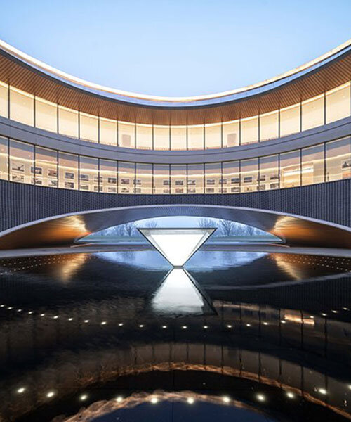 circular pools reflect arc formations at lacime architects' hotel in zhengzhou, china