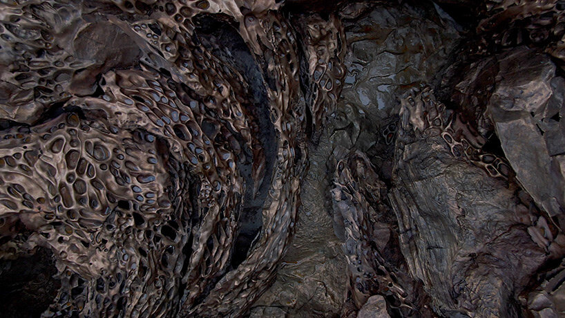 cristina iglesias infills remote island lighthouse with monumental bronze-cast forms