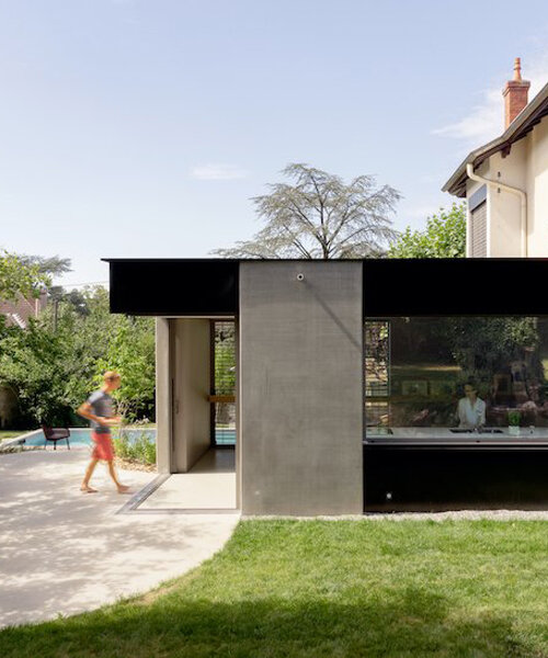 dank architectes reconciles new and old with this concrete extension in france