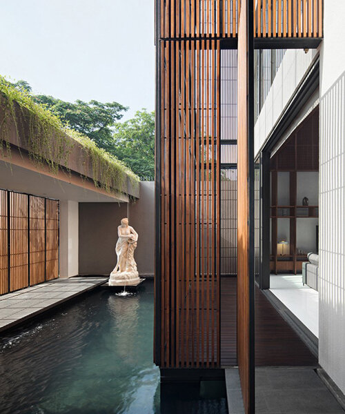 eben lontoh brings serenity to a house designed between two courtyards in jakarta