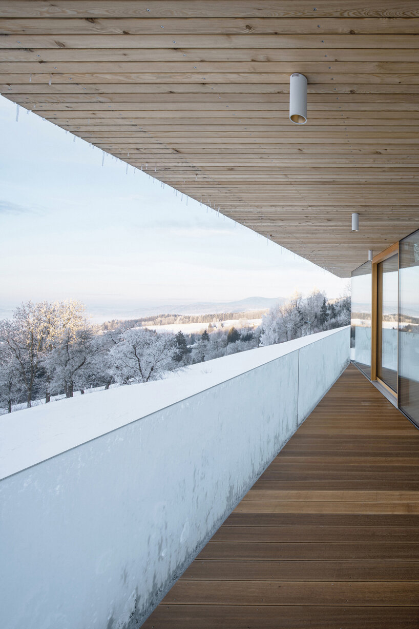 fránek architects embeds a timber-clad house into czech mountains designboom