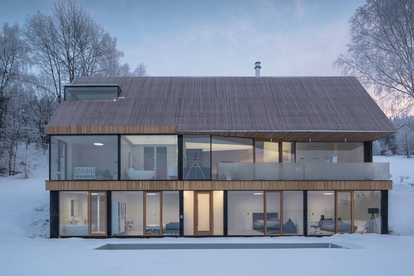 fránek architects embeds a timber-clad house into czech mountains designboom