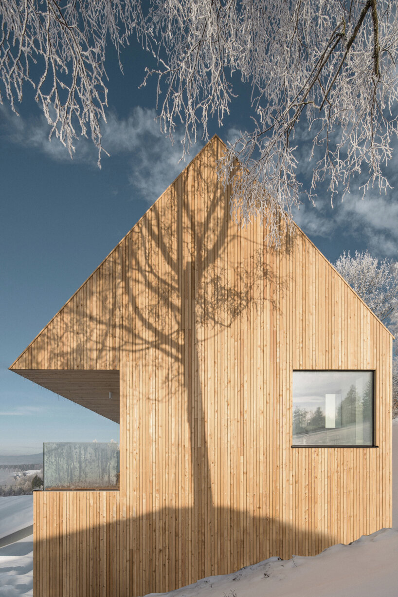 fránek architects embeds a timber-clad house into czech mountains designboom