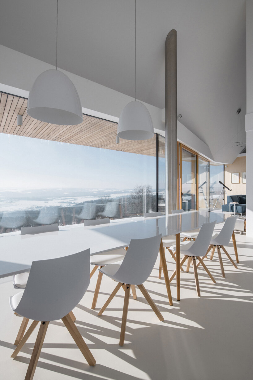 fránek architects embeds a timber-clad house into czech mountains designboom